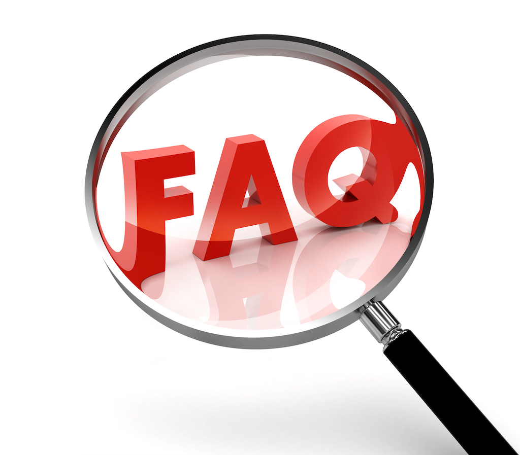 Red FAQ with magnifying glass on white background, representing FAQs about AC repair.