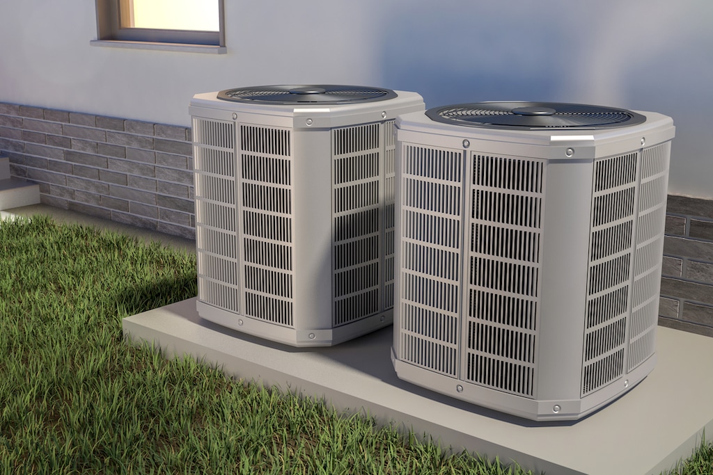 Two AC units outside of home.|  Air Conditioning Service