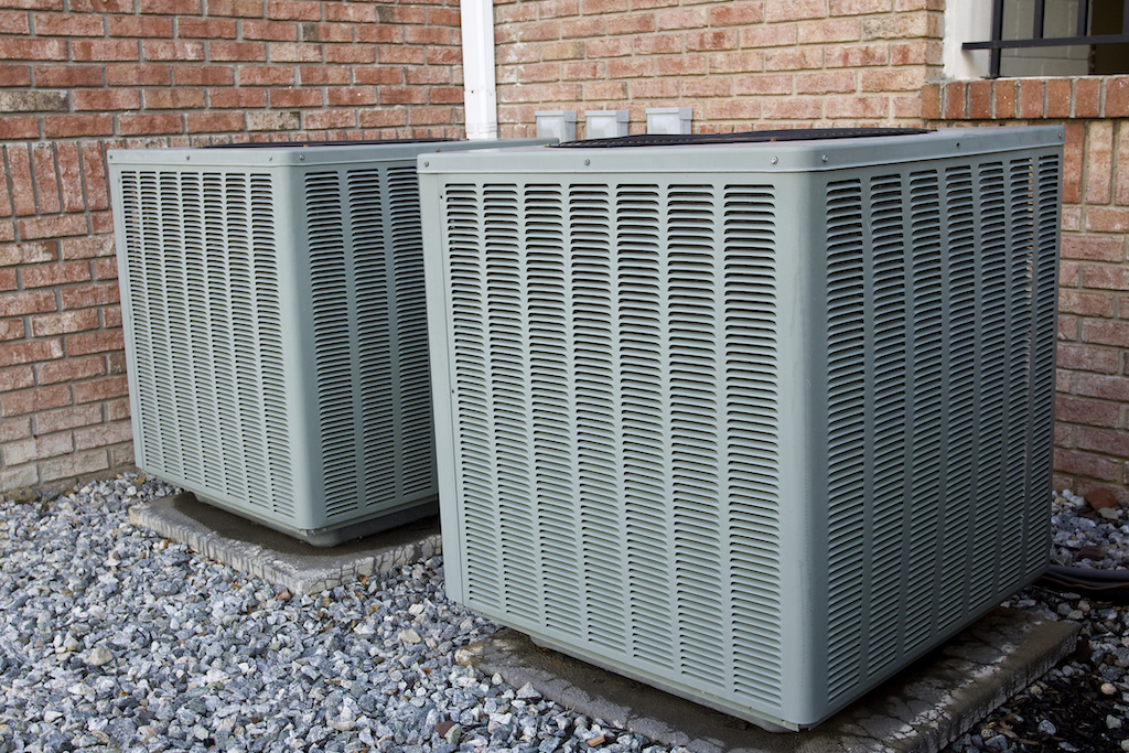 AC units outside of home. | Components Of HVAC System Residential