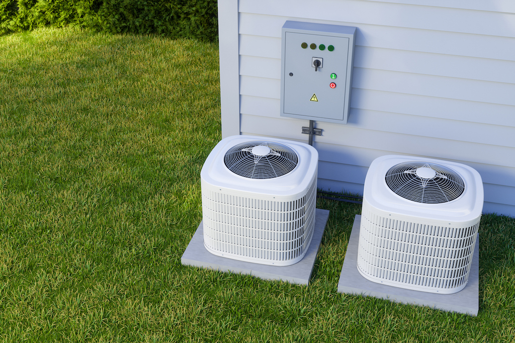 Air conditioning units in garden. | Residential HVAC Design Guide
