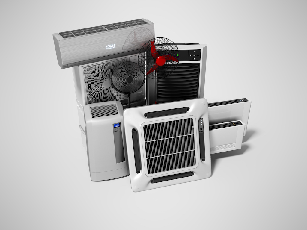 Various types of HVAC units in a pile. | Ductless Mini Split AC
