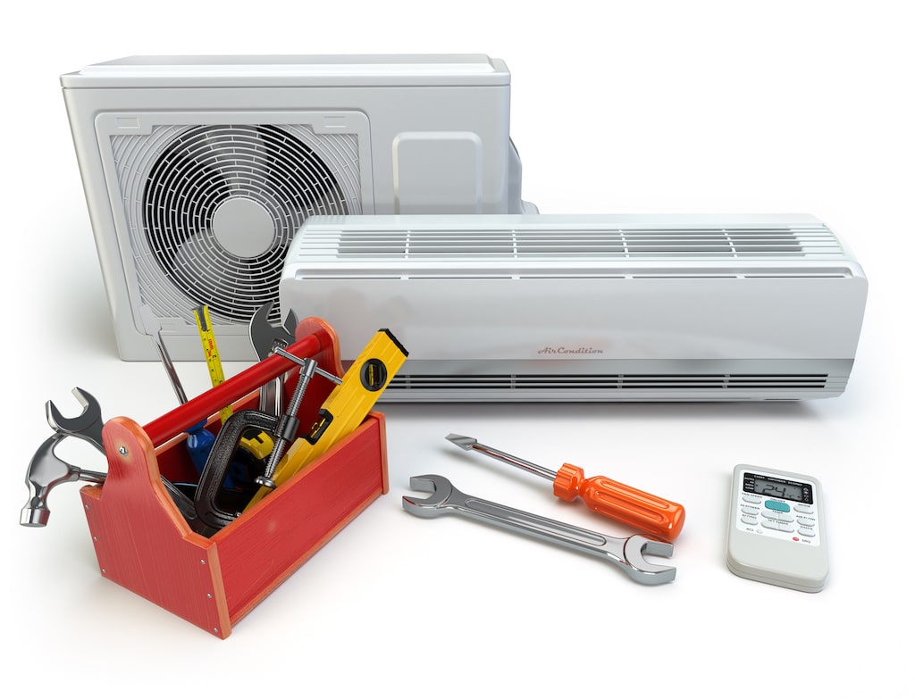 White background with red toolbox, hvac unit and AC technician tools. Compound Gauge HVAC