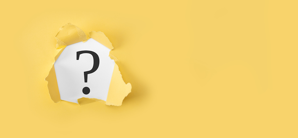 Yellow background with question mark for AC repair company FAQs