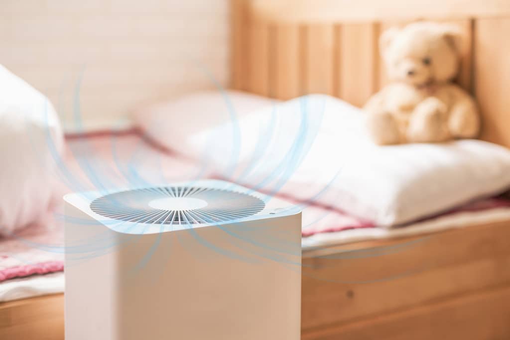 UV Air Purification in children's room with teddy bear on bed.