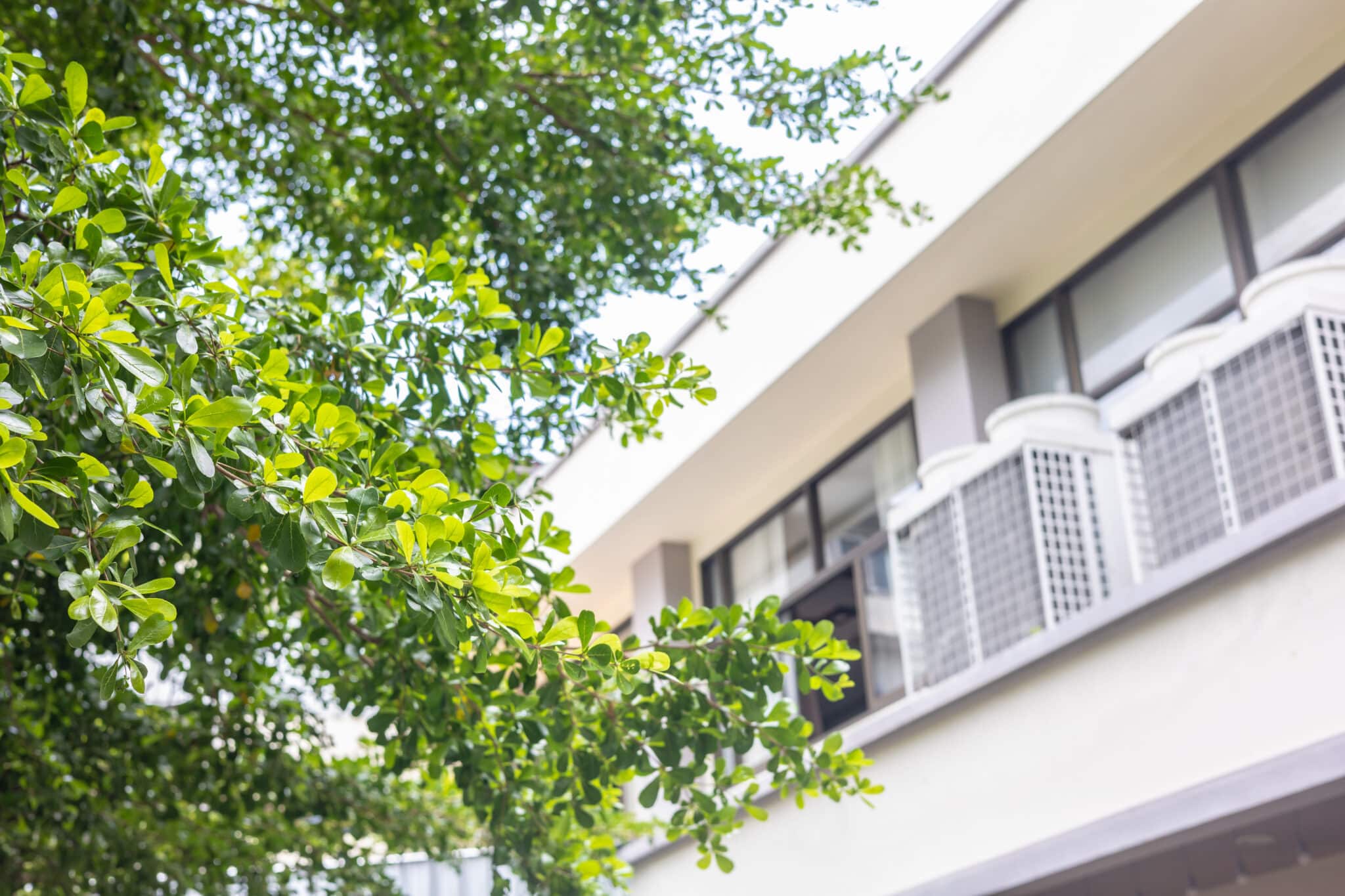 Air conditioner hot unit with green tree nature for saving energy home power consumtion air conditioning cost, Apartment air conditioning units, HVAC Efficiency.