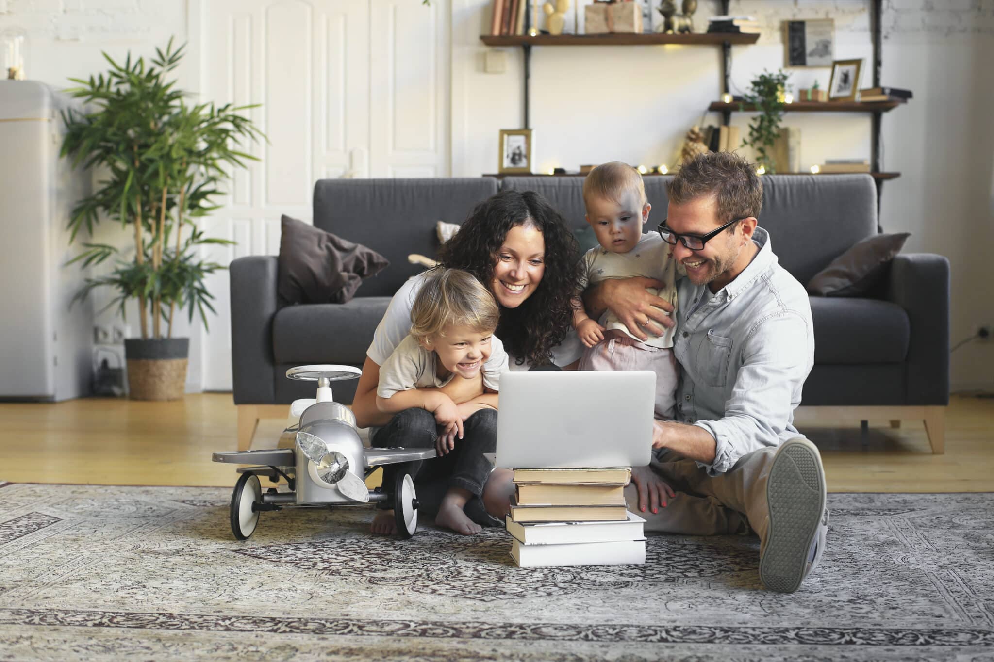 Young beautiful happy family relaxing, Microbial HVAC Filters.