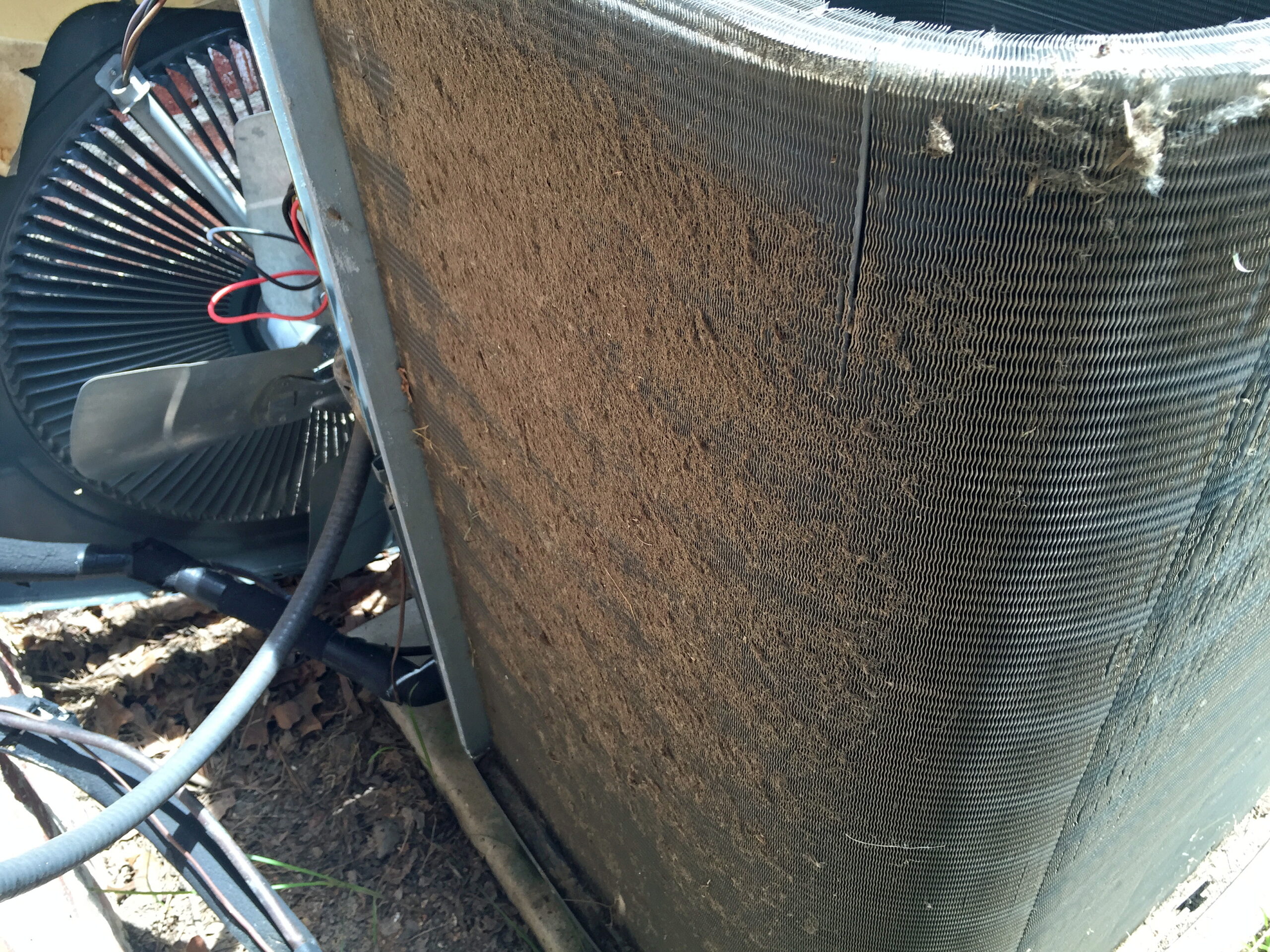 Dirty condenser coil fin, signs you need a coil cleaning service.