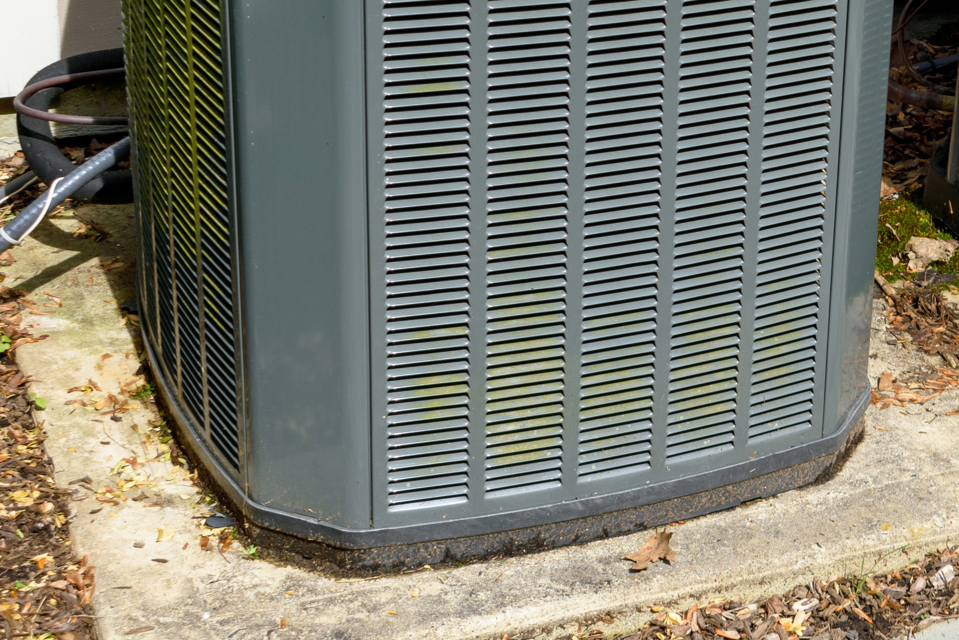 Outdoor units, Worn rubber, Vibration isolation pads.