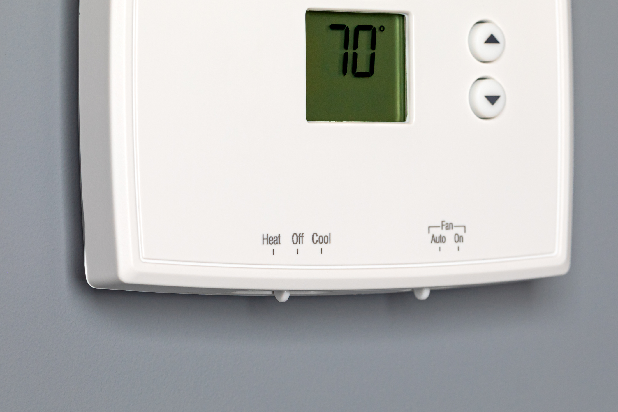 Thermostat of air conditioner installed on the wall, Thermostat battery replacement.